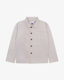 Front view of Uskees light gray shirt jacket with brown buttons on a white background