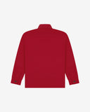 Reverse of berry red buttoned organic cotton workshirt from Uskees showing reinforced elbows, tailored cuffs and boxy profile.