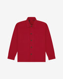 Berry red buttoned organic cotton workshirt from Uskees with clear view of chest pocket and utilitarian silhouette.
