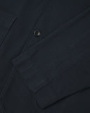 Closer detail view of patch pockets, cuff detailing, corozo buttons and extra durable weave of the organic cotton drill fabric.