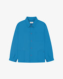 Full front view of Uskees opal-blue organic herringbone cotton engineer jacket with 2 deep hip pockets with internal ticket pocket and chest pocket.