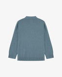 Flat back view of knitted organic cotton blue-grey collared cardigan from Uskees with view of ribbed cuffs and waistband.
