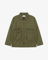 Front view of Uskees ivy green ripstop field jacket showing the chest zip pockets and gusseted pockets with flaps.