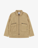 Front view of Uskees khaki ripstop field jacket showing the chest zip pockets and gusseted pockets with flaps.