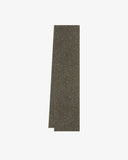 Neatly folded Donegal Merino wool scarf in a speckled army green colourway.
