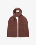 Donegal Merino wool scarf in speckled brick red, arranged in a knotted loop.