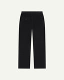 Full length back-view of midnight blue corduroy 5005 trousers with view of rear pockets, belt loops and flattering straight leg fit.