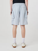 Back view of model wearing Uskees 5026 pale blue-grey Technique trekking shorts with dark t-shirt. View of 3 back pockets.