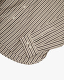 Uskees cream and glade green terrace pinstripe men's advanced Oxford shirt showing the buttons, cuff and pinstripe pattern.